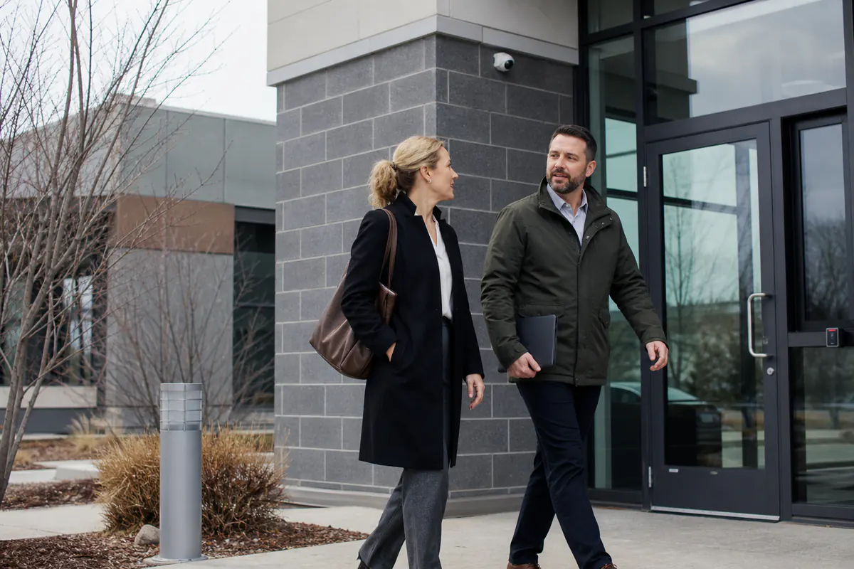 Security consultant and facilities manager reviewing a commercial property